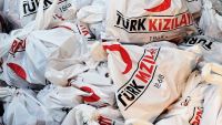 الهلال الأحمر التركي يوزع 1250 طنا من الدقيق في الجوف